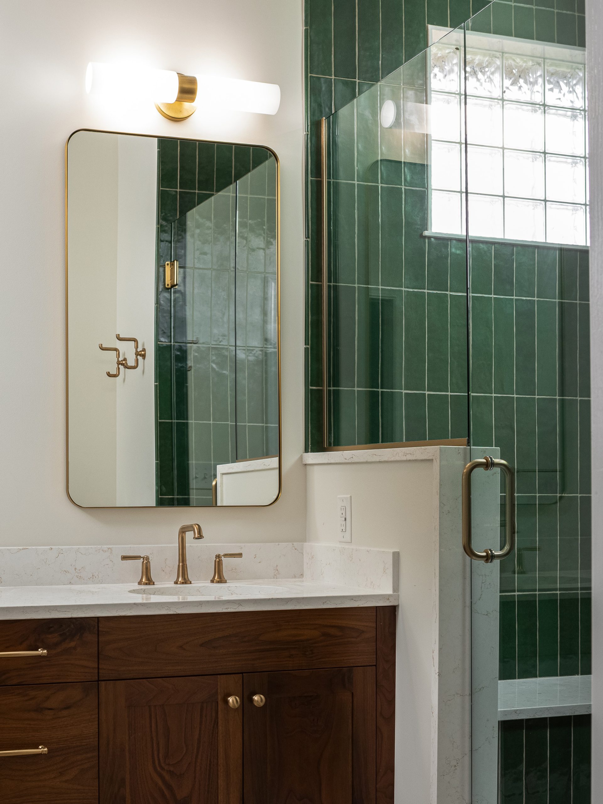 bathroom with vanity and mirror