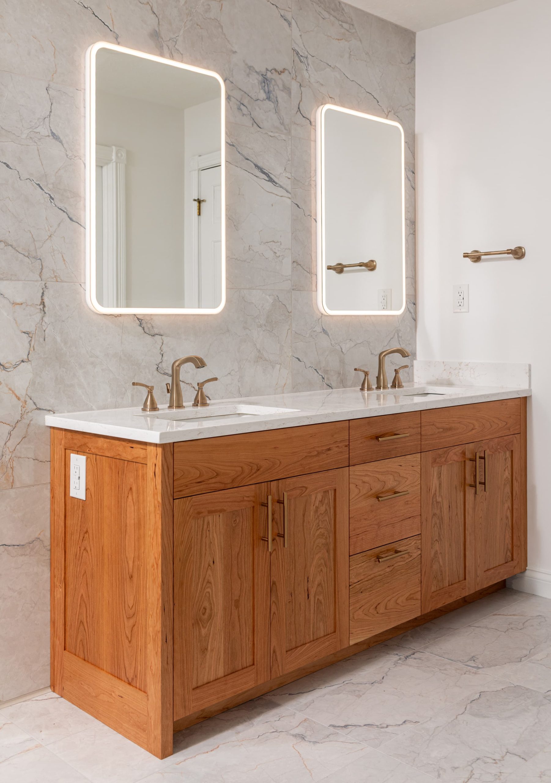 bathroom vanity with lights on mirrors